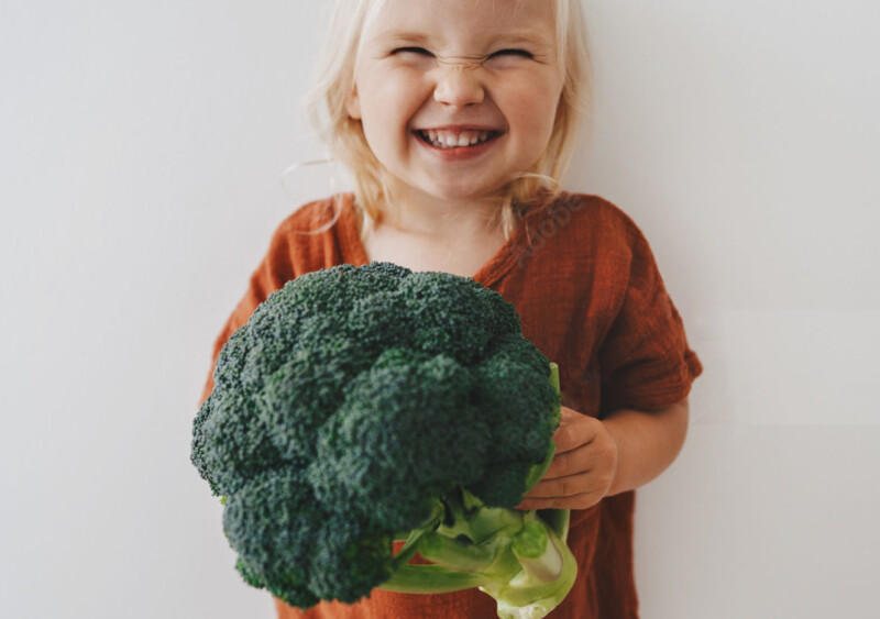 Girl Holding Fresh Local Produce From Maloneys Grocer Surry Hills